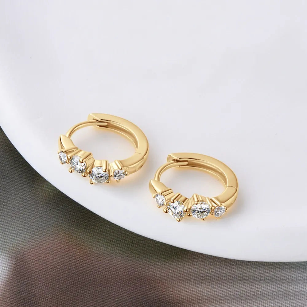 Moissanite Huggie Earrings in 925 Silver – 14k Gold Plated by Syleane